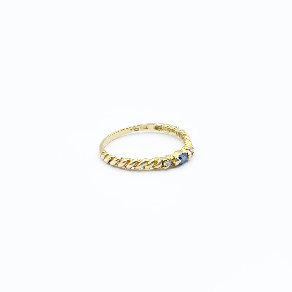 Spiraled Golden Ring with Diamonds and a Sapphire
