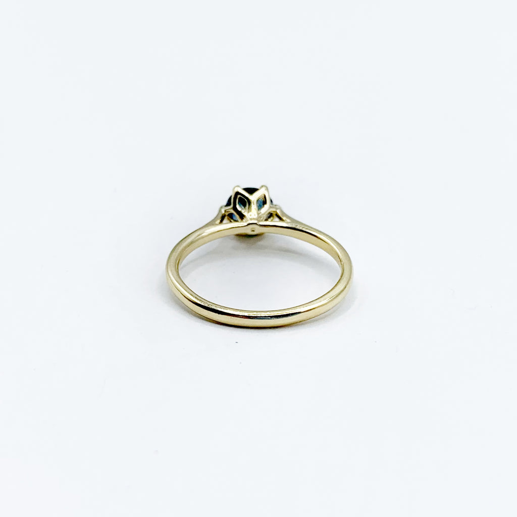 Deep Blue Sapphire on a Golden Band