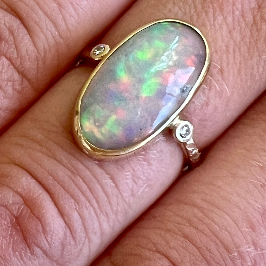 Ethiopian Oval 14 Karat Yellow Gold Ring with 2 Diamonds