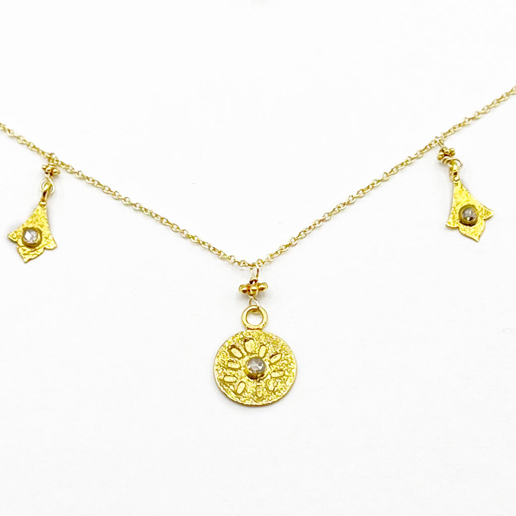 Bright Gold and Diamonds Floating on a Gold Chain