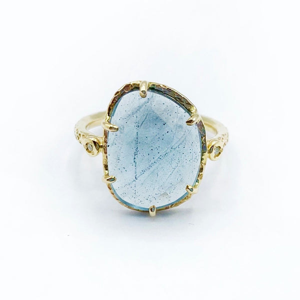 Icy Blue Aquamarine Clutched in Gold